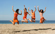 four girls jumping