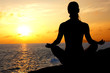 lotus position on the edge of a cliff
