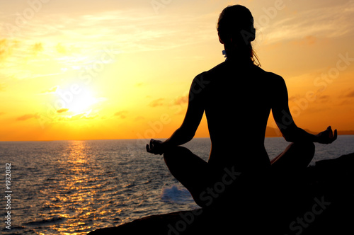 lotus position on the edge of a cliff