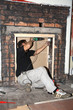 electrician fixing socket boxes