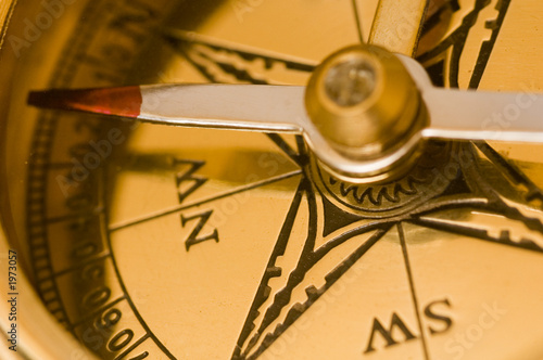 old style brass compass closeup
