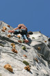 climber climbing on wall