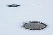 holes in ice holes in ice
