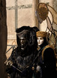 venice carnival: couple in bacl and gold venice carnival: couple in bacl and gold