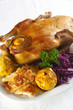 grilled duck with red cabbage and baked apples