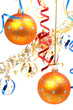 two yellow new year's spheres on a background of a tinsel