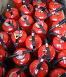 heap of red fire extinguishers