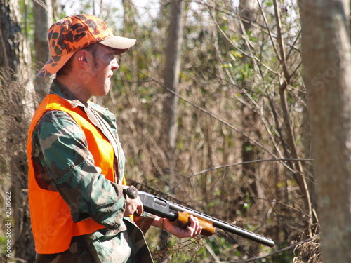 Photo: man hunting in the woods man hunting in the woods