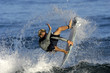 surfer doing a grab ariel