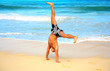 cartwheels in the sand