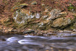 stream and rocks in winter stream and rocks in winter