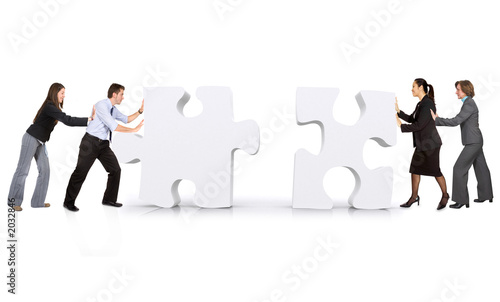 Foto: business teamwork - puzzle pieces business teamwork - puzzle pieces