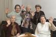 senior women at the game table senior women at the game table