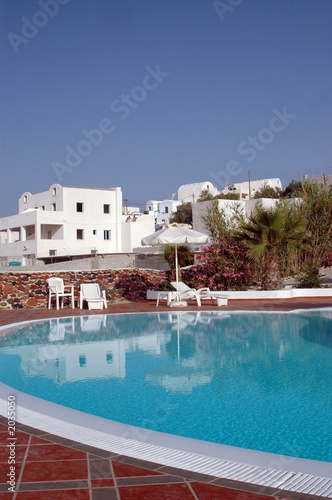 hotel pool with greek island architecture