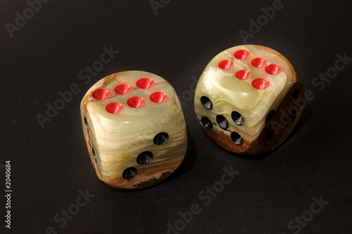 playing dice on black