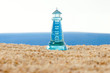 lighthouse before a turbulent sea