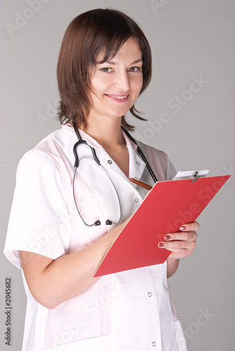 Photo: doctor taking notes doctor taking notes