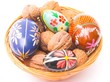 easter eggs and walnuts in the basket