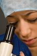 doctor / scientist with microscope