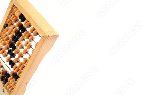 Photo: an old mathematical abacus on a white background an old mathematical abacus on a white background