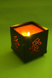 candle with hieroglyph on green candle with hieroglyph on green