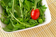 salad with rugola and cherry tomato (closeup) salad with rugola and cherry tomato (closeup)