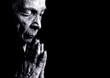 old woman praying