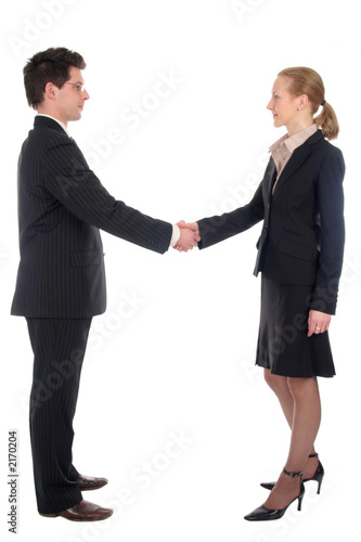 businesswoman and businessman shaking hands