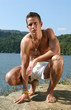 muscular teen at the beach