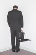 businessman stands in the corner businessman stands in the corner