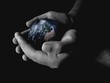 globe in hands