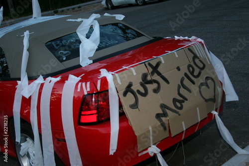 decorated car just married white red tp wedding