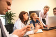 group of five business people working  on project
