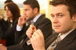 group of business persons at a conference, man in