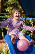Photo: girl playing on slide girl playing on slide