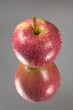red apple reflected
