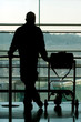 man waiting at the international airport terminal