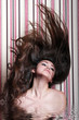 sexy girl in water throwing her long hair back sexy girl in water throwing her long hair back