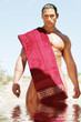 sexy handsome man covered with spa towel