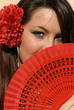 shy woman with fan