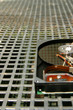 hard disk on a metal grid hard disk on a metal grid