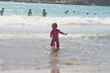 little girl running in the sea