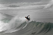 bodyboarder on top of the wave
