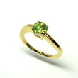 bague or jaune pierre verte