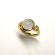 bague or jaune cabochon