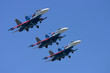 three airplanes at airshow