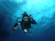 Photo: diving girl with camera diving girl with camera