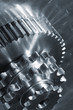 gear-machinery teamwork in shiny titanium