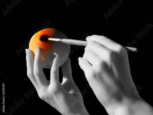 hand and apple