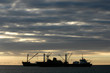 cargo boats at sunset cargo boats at sunset